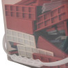 handle of a container filled with plastic fire door packer strips in red and white
