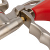 Close-up of the trigger of a pu foam applicator gun showing metal parts and a red handle