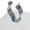 Close-up of a chrome metal spring clip fixed to a clear acrylic panel