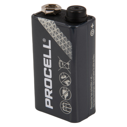 Duracell Procell 9v alkaline battery shown at an angled view with branding and safety icons visible