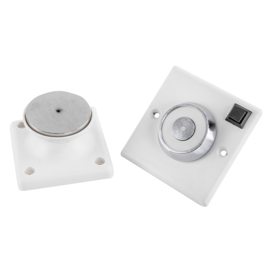 230v 200n conquest steel flush mounted door retainer showing two white mounting bases with circular steel parts and a switch