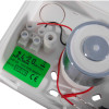 Close-up internal view of the 24v 200n white wall mounted door retainer doormouse showing wiring and components