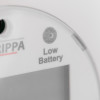 Partial view of geofire agrippa deaf alert pillow alarm with ubs1 showing low battery indicator light and part of the logo