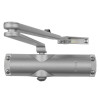geze ts1000c overhead door closer in silver colour shown from the front with visible arm and mounting screws