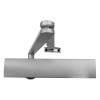 Front view of a silver geze ts4000 overhead door closer showing the main body and arm mechanism