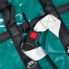 bariatric evacmat showing a close-up of a black and red buckle attached to white and black straps on a teal background