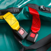 Close-up detail of safety buckles with red and yellow straps on a bariatric evacmat
