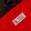 Label on the evac e pad with bag hospital aids showing contact information and safety testing details