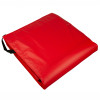 Red evac e pad with bag showing the mat folded and a black handle strap visible on white background