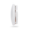 Side view of hispec longlife optical smoke alarm showing its white curved design and vents