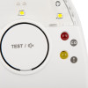 Close up of hispec deaf aid kit showing test button, two small LED lights, and labelled indicators for CO and alert