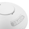 Close-up of the test button on the hispec rf pro heat alarm showing part of the product label