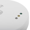 Closeup of the hispec radio frequency mains carbon monoxide detector showing indicator lights for power fault and alarm