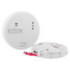 hispec radio frequency mains carbon monoxide detector shown with front and back parts and two red wall plugs
