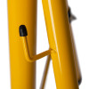 Close-up of the quick release lever on the hispec adjustable tripod for site lights showing yellow metal frame and black plastic tip