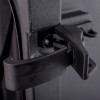 Close-up of the clasp on a hose reel cabinet showing its black plastic latch mechanism
