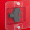 Black key inserted in a red hose reel cabinet panel with two white bolts visible