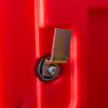 Close-up of a metal latch on a red hose reel cabinet