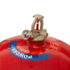 Close up of the top part of a 6kg automatic powder fire extinguisher showing the pressure gauge and release mechanism