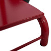 Close up of the red foot of a double extinguisher trolley bucket bracket showing the metal frame and protective cap
