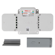 Rectangular Firechief electrical control unit with labelled terminals and two small metallic components placed below it