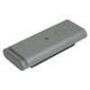 Compact grey electronic device with a central sensor opening, top button, and translucent end strip