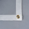 Close-up of Hsfwbl Light Duty Welding Blanket silicone coated edge with a brass eyelet detail against a grey background