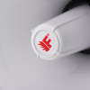 Close-up of the end of a white mini megaphone showing a red fire chief logo on the cap