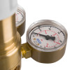 Close-up of a gauge on a nitrogen regulator with hose showing pressure measurements in bar and psi
