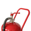 Release handle and pressure gauge on a red 50kg pwder wheeled fire extinguisher