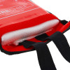 Closeup of an open firechief economy fire blanket showing red case and folded blanket inside with black straps