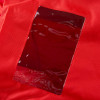 Close up detail of the red firechief wheeled fire extinguisher cover 50kg 50l showing the clear plastic window section