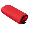 Rolled up evacuation sledge with wall mounted storage bag in bright red fabric