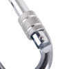 Close up of the screw gate mechanism on a steel screw gate karabiner showing textured grip and locking pin