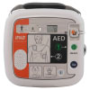 A white defibrillator with orange markings and a black 