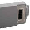 Close-up of the battery detail on a semi automatic defibrillator showing connection points and part of the casing