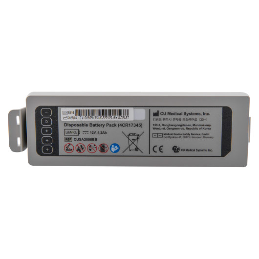 semi automatic defibrillator showing front side of a detachable disposable battery pack with labels and symbols