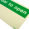 Close up of a push bar to open sign made of rigid plastic showing green and white text on size k background