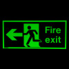 Green fire exit sign rigid plastic left side j on a dark background showing a running person and arrow pointing left
