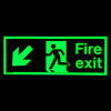 Fire exit sign rigid plastic down left glowing green on black background in dark