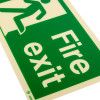 Close up of fire exit sign rigid plastic up left size k showing green and white emergency exit design