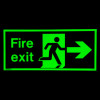 Green fire exit sign rigid plastic right size j showing running figure and right arrow on dark background