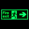 fire exit sign rigid plastic right size k glowing green in dark showing running figure and arrow pointing right