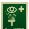 emergency eye wash sign portrait showing an eye with water drops falling into a basin and a medical cross on a green background