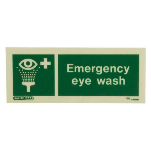 emergency eye wash sign in green with white text and a graphic of an eye being rinsed shown from the front