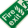 Close up of nhs fire exit sign rigid plastic up size k showing green and white fire exit text with flame symbols