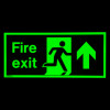fire exit sign rigid plastic up size j glowing green with running figure and arrow against dark background