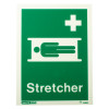 green stretcher location sign with white icon of person on stretcher and cross text stretcher on rigid plastic
