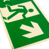 close up of fire exit sign rigid plastic up right size j showing running person and arrow on green background