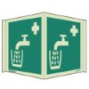 panoramic sign showing a water tap pouring drinking water into a glass with a medical cross symbol